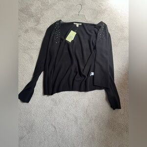 Large sized Carolyn Taylor black bedazzled cardigan sweater.